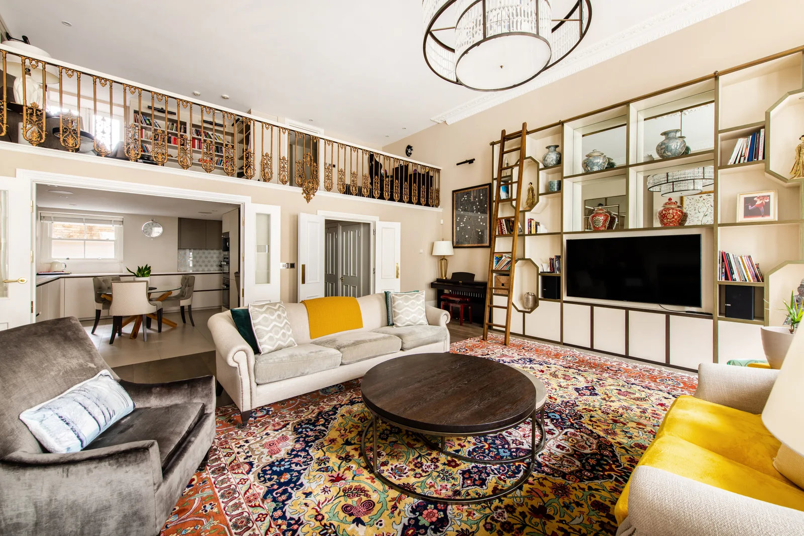 Living room with mezzanine, interior designed by Maria Morgan Design Studio